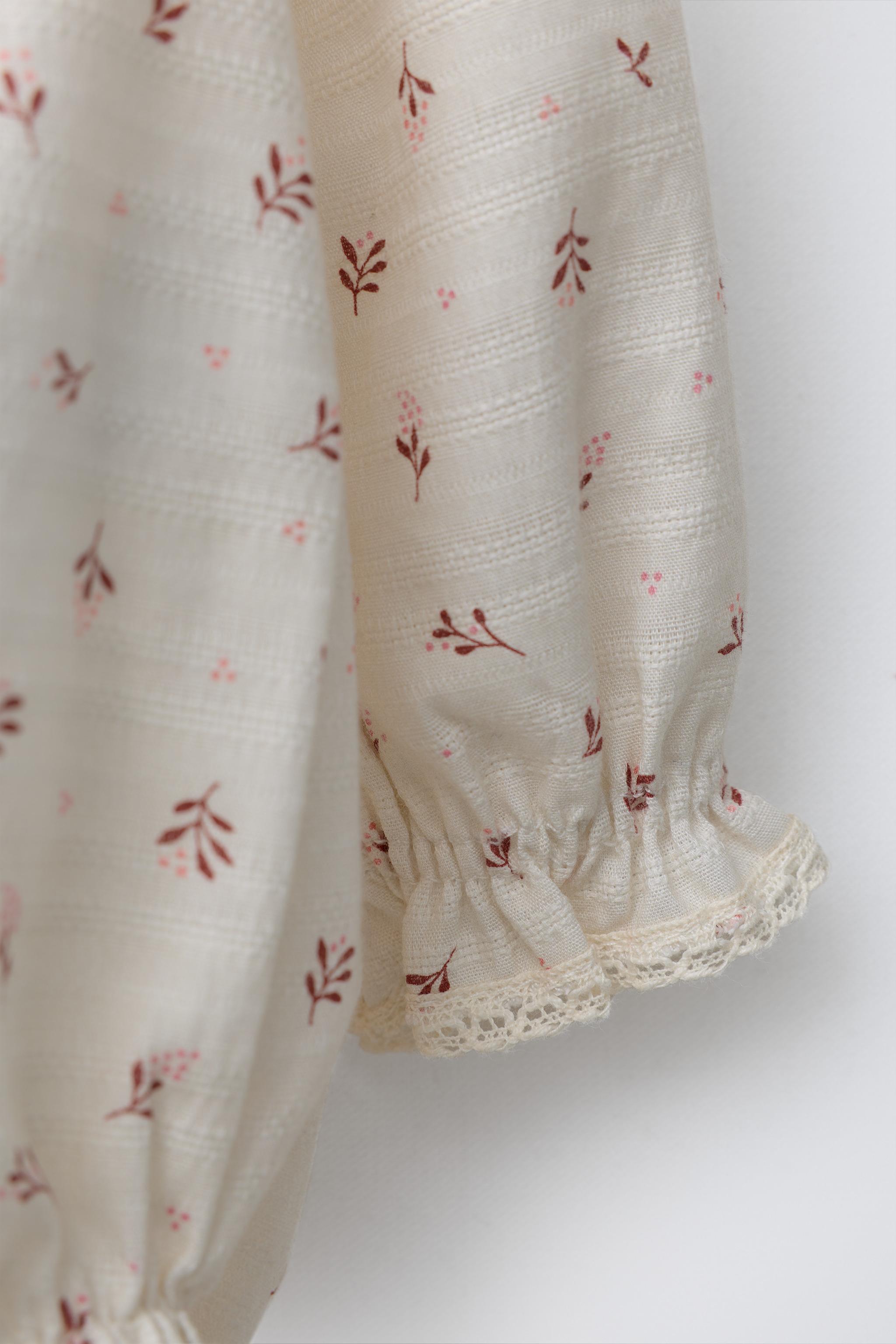 LACE TRIM FLORAL BODYSUIT